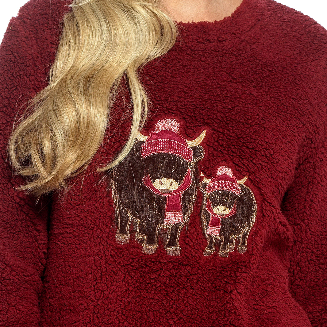 Daisy Dreamer women's highland cow print cotton jersey pyjama set with long sleeves, available in sizes S to XL.