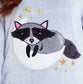 Cuddly Raccoon Fleece Hooded Pyjama Set for Women and Girls Super Soft Sherpa Lined Nightwear Ideal Mother Daughter Gift Cosy Boutique by Daisy Dreamer. Buy now for £15.00.
